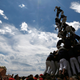 Castellers Capgrossos de Mataro fall down after forming a human tower called “castell” during Sant Pere festival in El Masnou, near Barcelona.